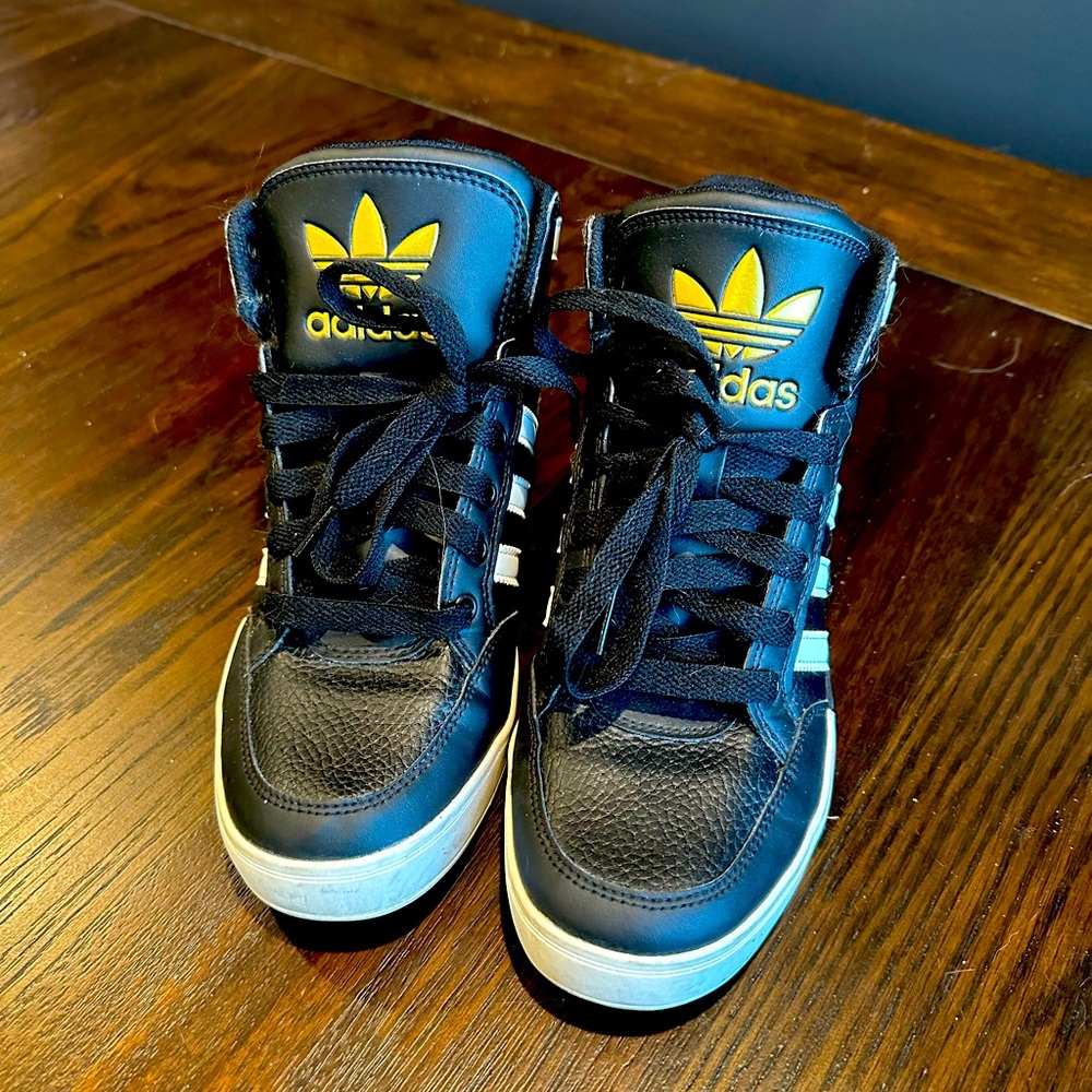 Black and gold adidas